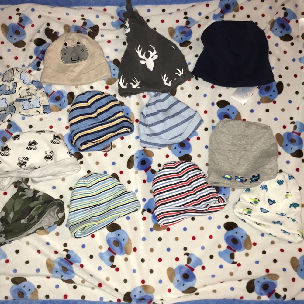 Twelve baby hats